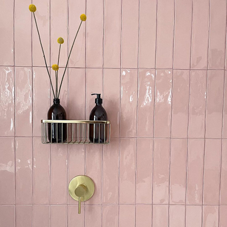 Vertical stacked pink tiles with grey grout