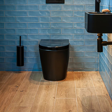 Beige tiles in bathroom with black accessories
