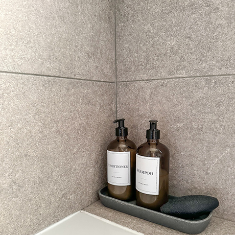 Grey tiles in bathroom setting