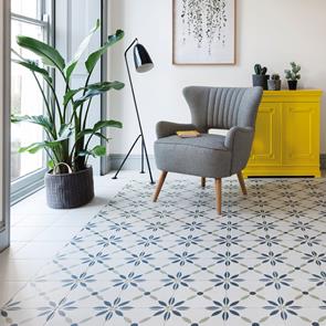 Living space with havana décor tiles and bayamo white creating a border, with contemporary duck egg skirting boards.